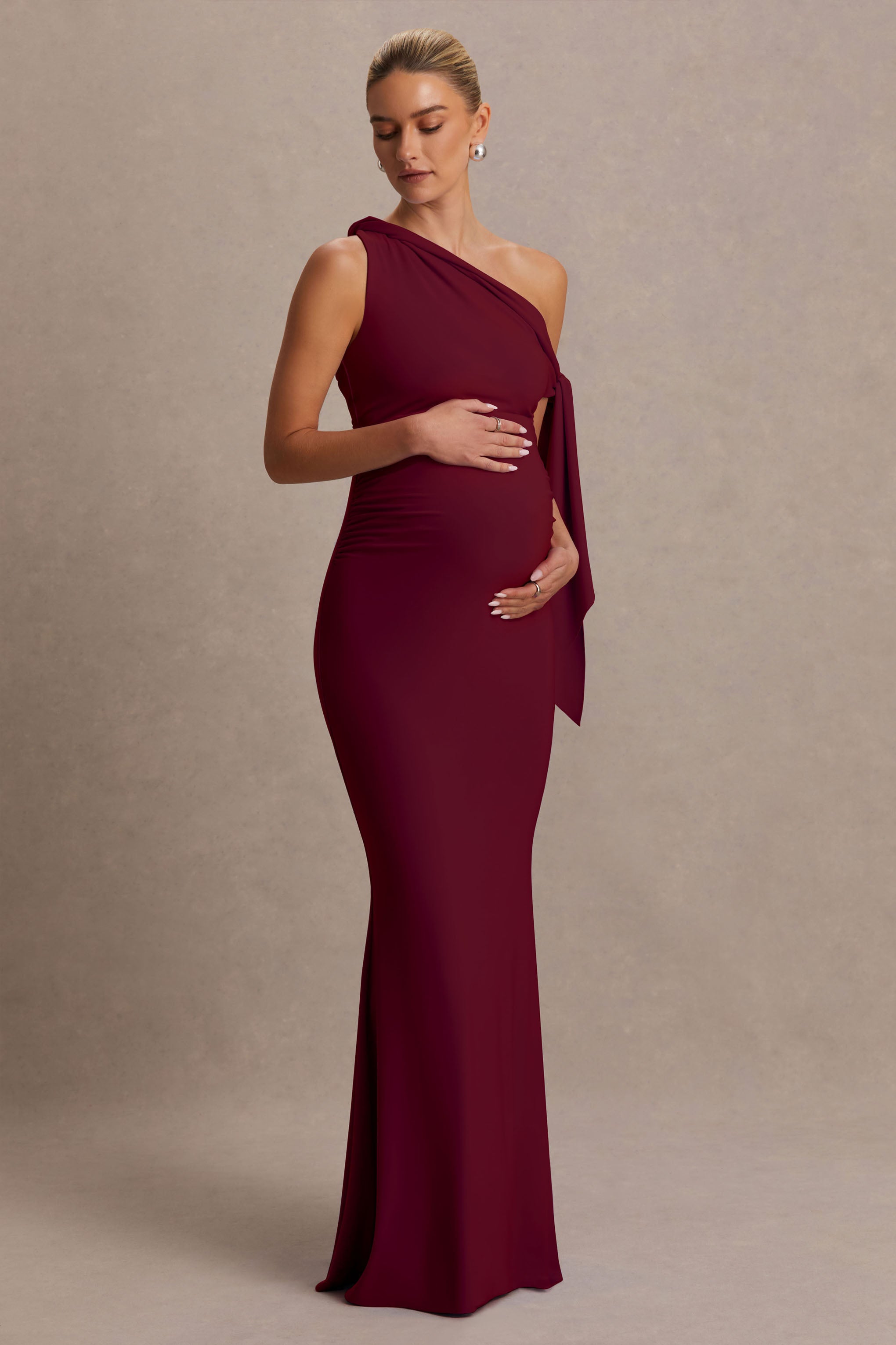 Orielle | Burgundy Asymmetric-Neck Maternity Maxi Dress With Knot-Sleeve And Sash